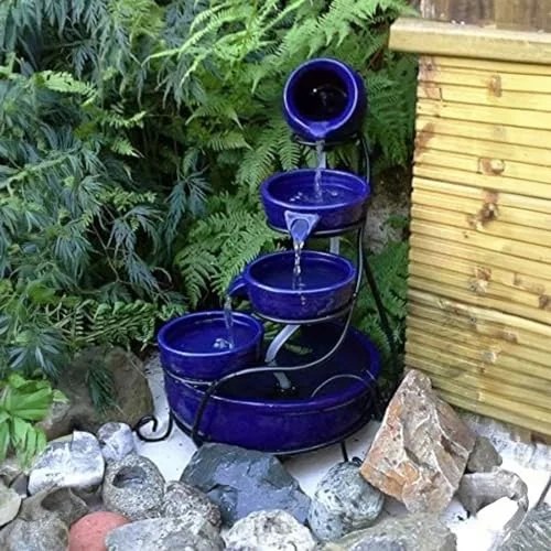 Outdoor lounge area with Moroccan style poufs and low tables