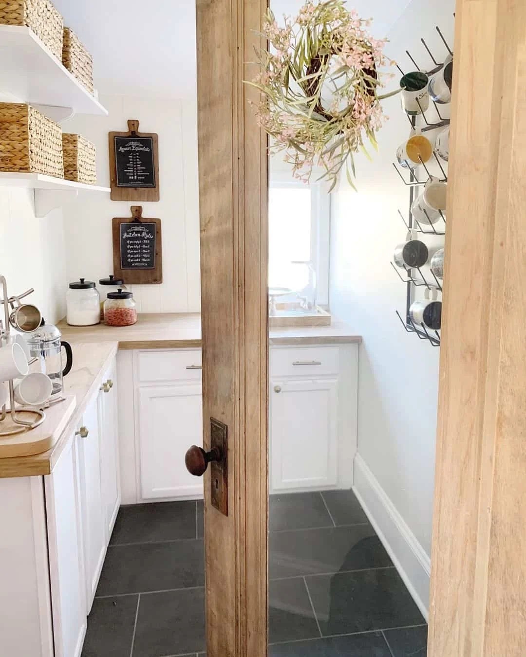 Rustic walk-in pantry ideas with exposed brick walls
