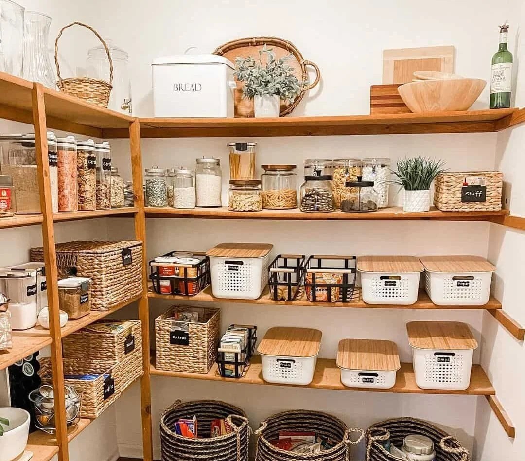 Functional walk-in pantry ideas with labeled storage containers and baskets