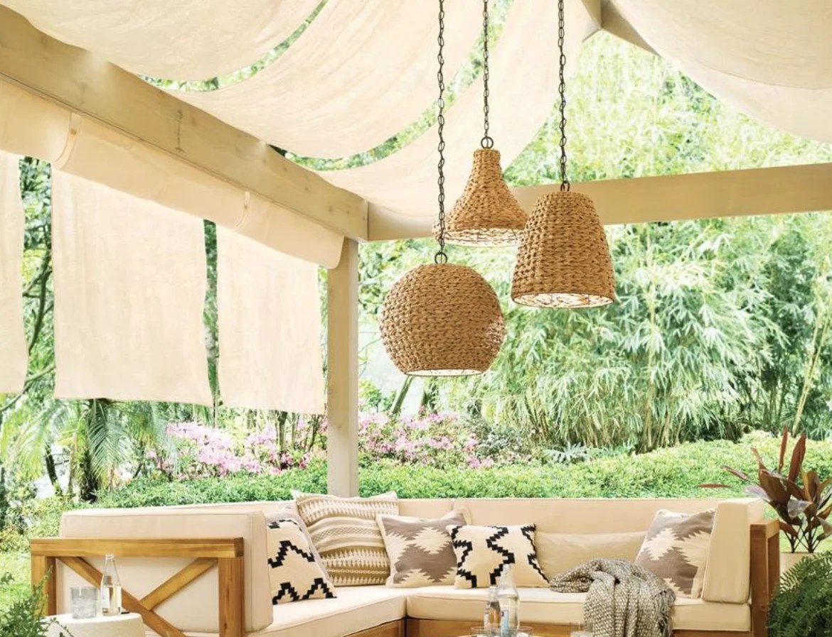 Artful wall hangings adding flair to bohemian backyard ideas